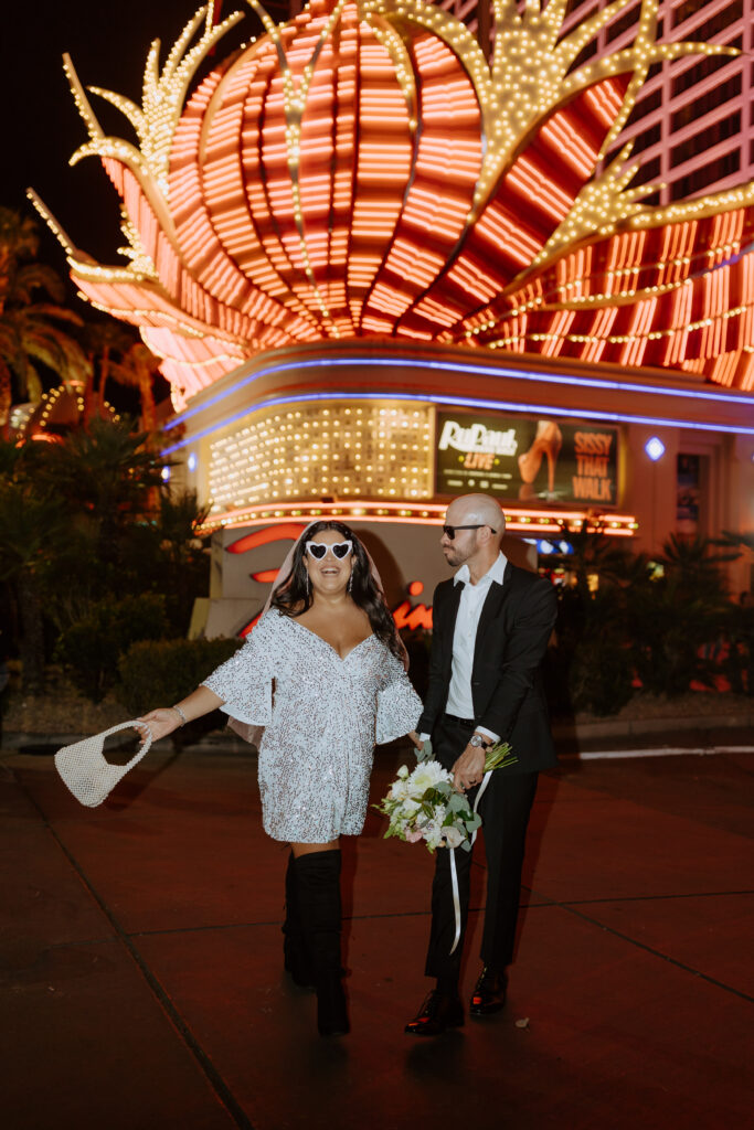 Take photos after under the Flamingo hotel lights at night